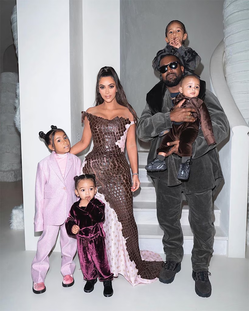 Kim Kardashian and Kanye West with their kids