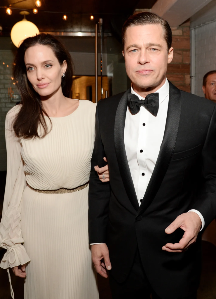 Angelina Jolie and Brad Pitt at an event