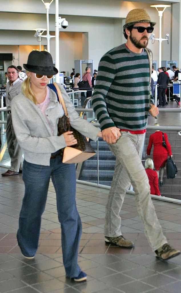 Ryan Reynolds and Scarlett Johansson holding hands