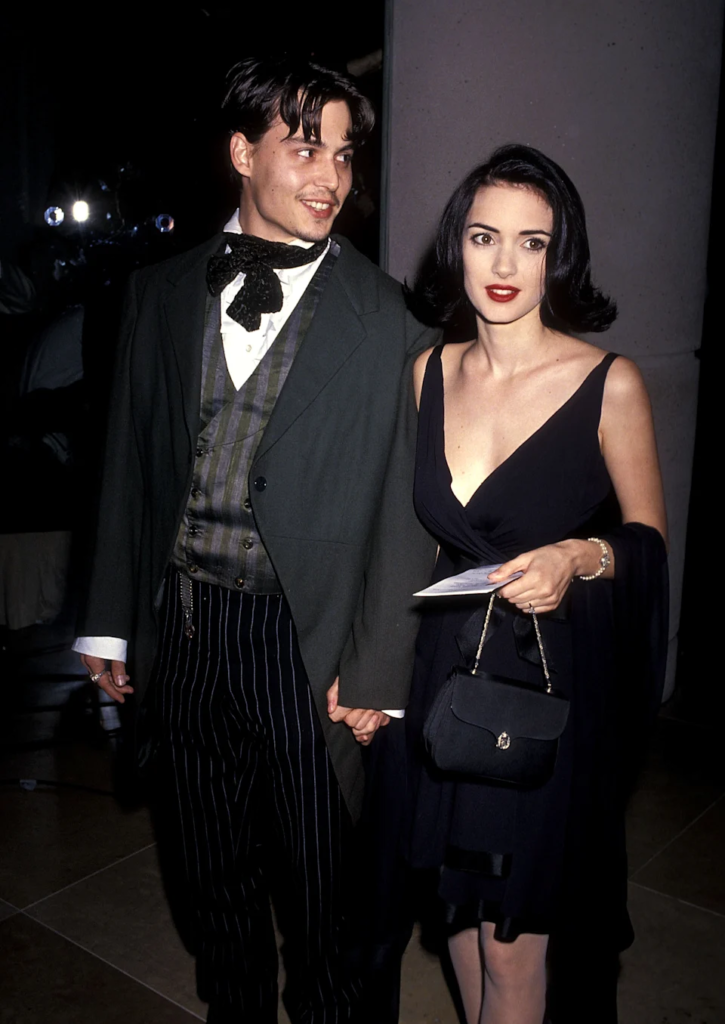 Johnny Depp and Winona Ryder smiling