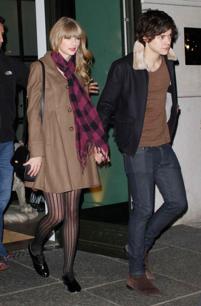 Harry Styles and Taylor Swift holding hands