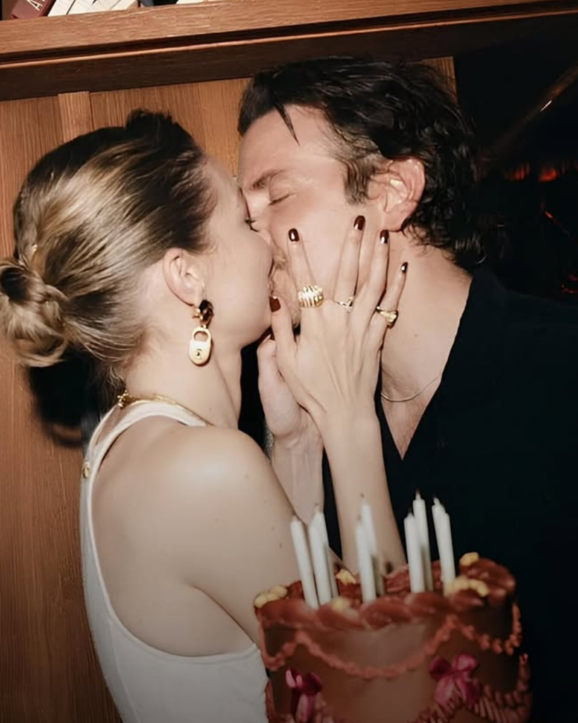 Bradley Cooper and Gigi Hadid kissing during her birthday
