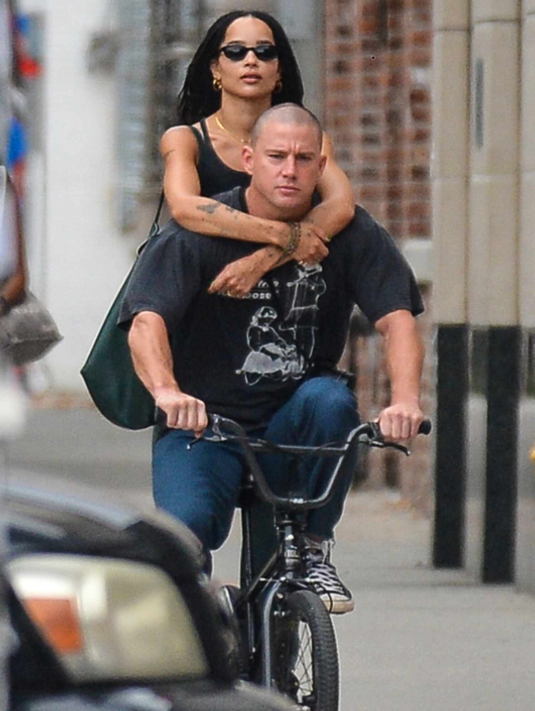 Zoë Kravitz and Channing Tatum riding on a bicycle