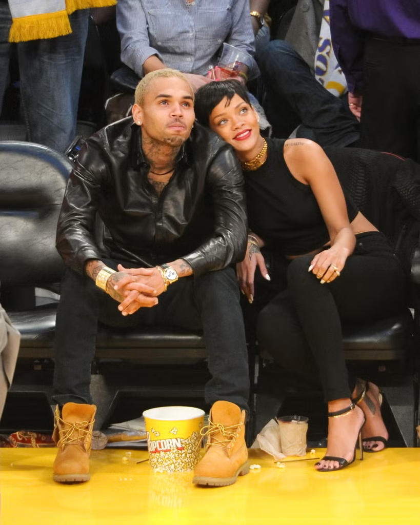 Chris Brown and Rihanna at a game