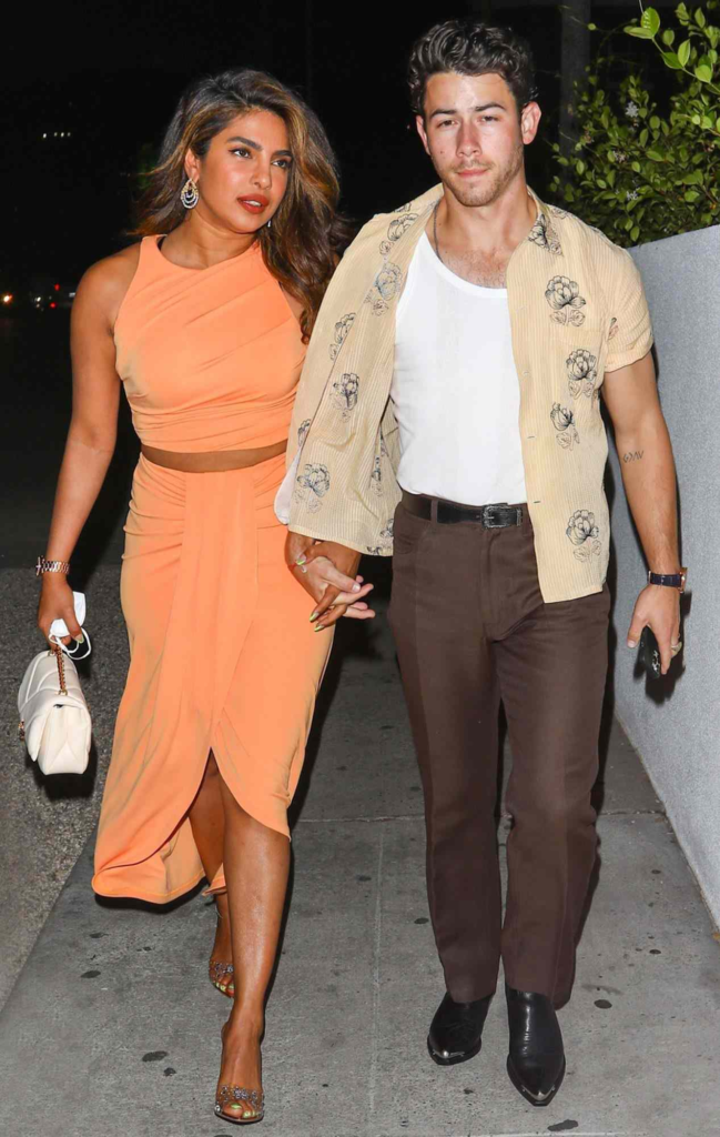Nick Jonas and Priyanka Chopra holding hands
