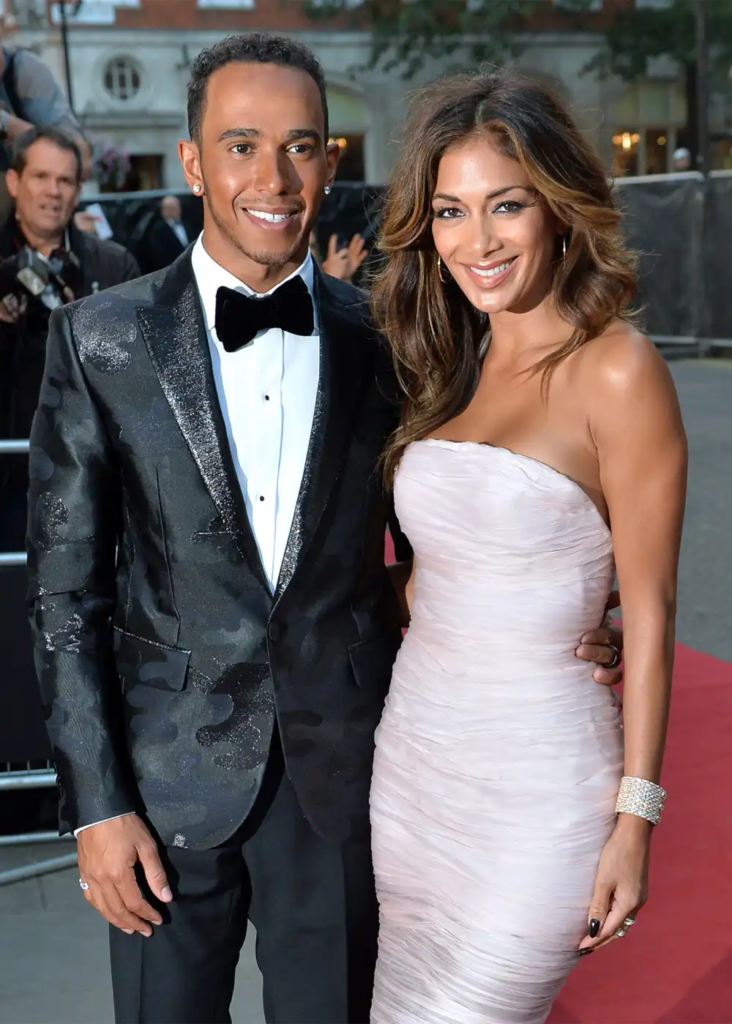 Lewis Hamilton and Nicole Scherzinger smiling