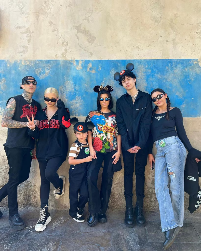 Kourtney Kardashian and Travis Barker with their kids