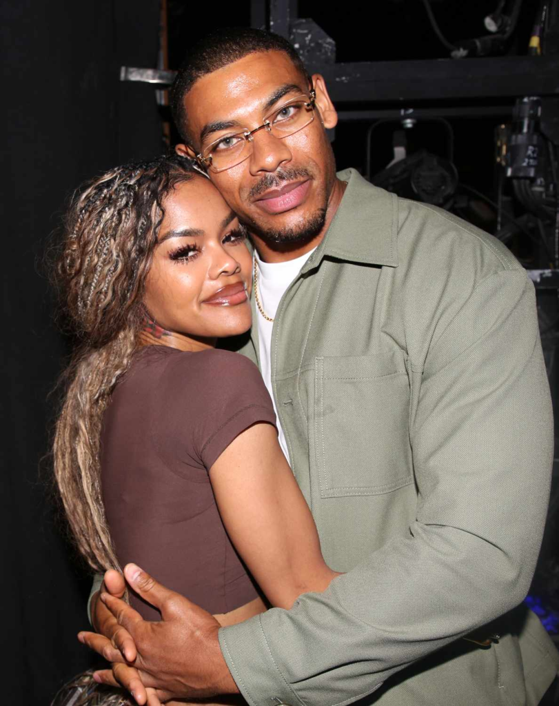 Teyana Taylor and Aaron Pierre hugging