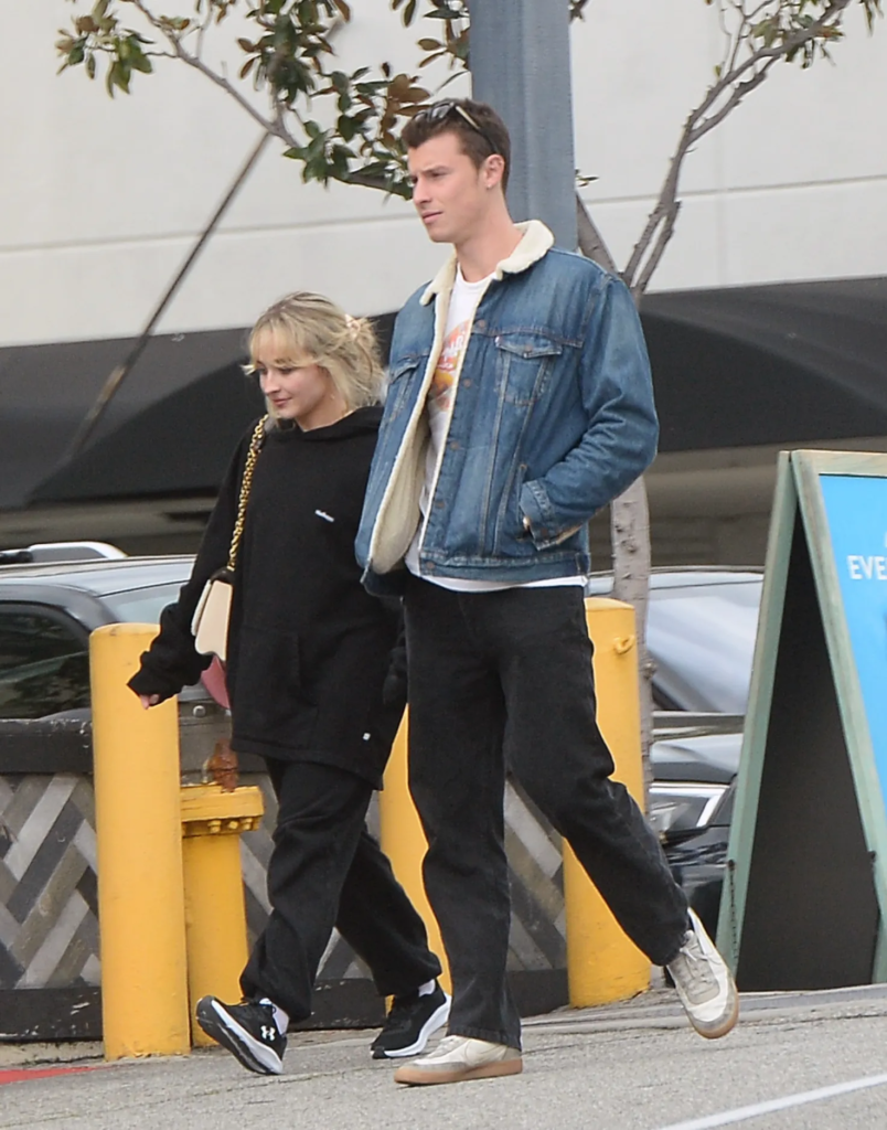 Shawn Mendes and Sabrina Carpenter walking