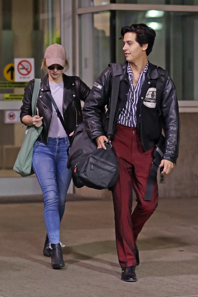 Lili Reinhart and Cole Sprouse walking